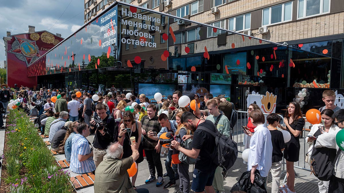 People line up for McDonald's reopening in Moscow