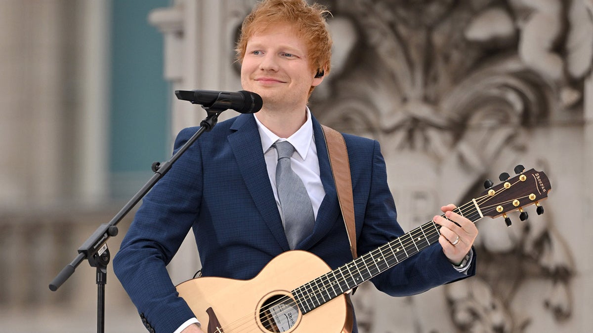 Ed Sheeran on stage with guitar