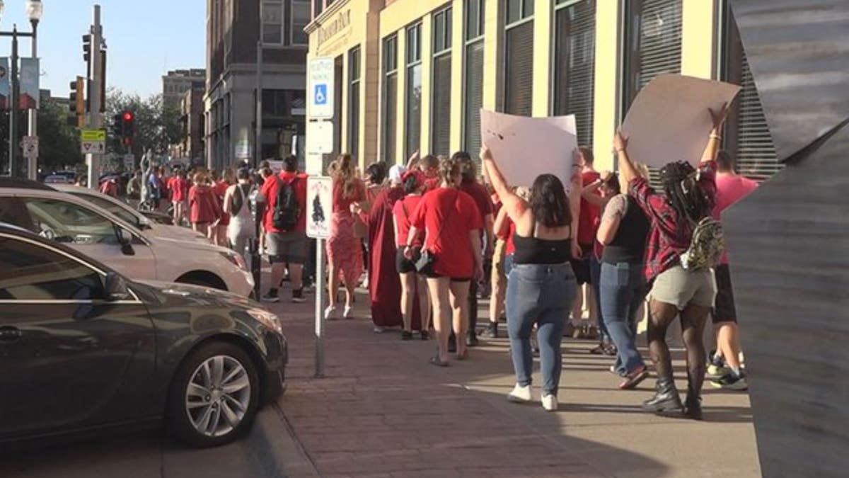 Pro-choice protesters in Sioux Falls march through downtown. 