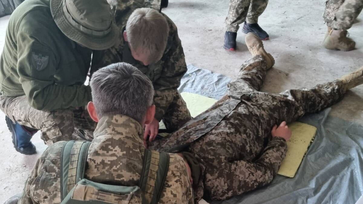 Ukrainian Territorial Defense Forces receive combat life saver training from Army veteran