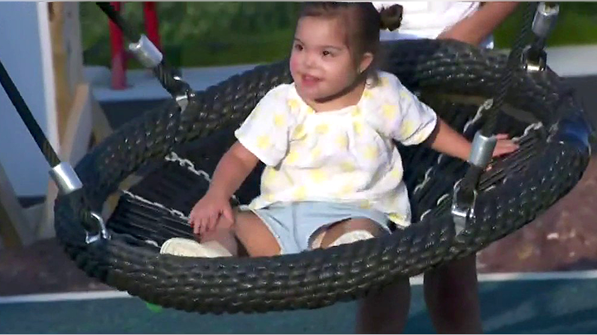 valentina duffy on a swing