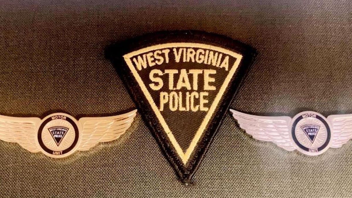 Badge featuring West Virginia police insignia
