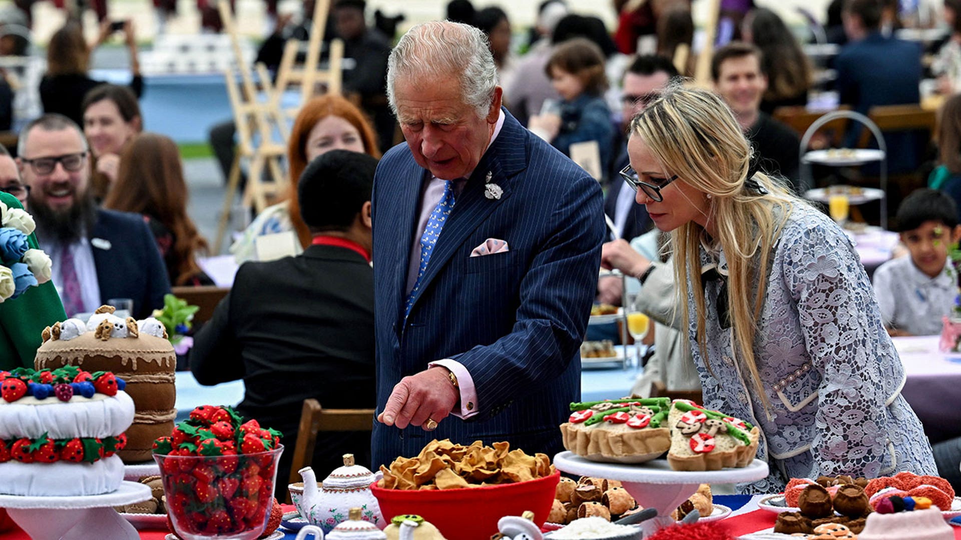 Prince Charles looks at Oval cricket ground decorations