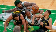 Warriors' Steph Curry comes up lame after fighting for loose ball