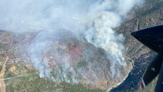 California fire injures 5 firefighters, threatens hundreds of structures