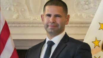 Rhode Island police officer pleads not guilty to assaulting political opponent at pro-choice rally