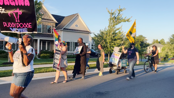 Pro-choice activists march outside home of Supreme Court Justice Amy Coney Barrett