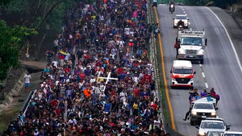 Migrant caravan organizer says Mexico has offered work visas as numbers surge