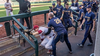 Oklahoma's Blake Robertson makes incredible diving catch into Notre Dame dugout