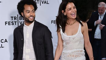 Katie Holmes and boyfriend Bobby Wooten III hold hands as they attend ‘Alone Together’ premiere