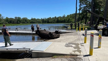 Delaware scuba team pulls decades old car from lake
