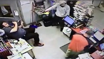 Los Angeles area gas station gunpoint robbery caught on video, suspects still at large