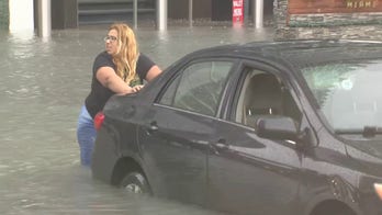 Florida tropical disturbance brings flooding, torrential rainfall