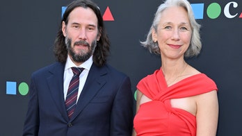 Keanu Reeves and girlfriend Alexandra Grant make rare red carpet appearance together holding hands