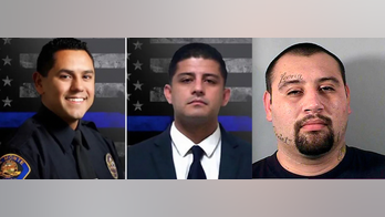 Wife of man who allegedly killed 2 Los Angeles-area police officers says she tried to warn cops he had a gun