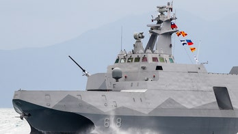 Taiwan warns China it has a missile capable of striking Beijing