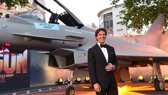 ‘Top Gun: Maverick’ star Tom Cruise arrives via helicopter to premiere 