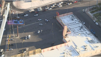 Shooting on iconic Las Vegas Strip leaves security guard, suspect injured