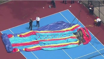 NY inflatable slide collapses, injuring school children on field day