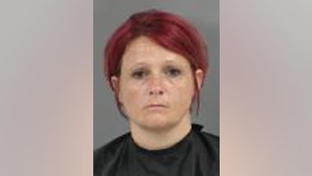 South Carolina woman arrested after 3 children left on lake island; boyfriend still wanted