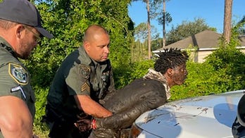 Florida man accused of carjacking street sweeper tackled into muddy ditch during police chase