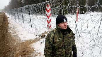Poland completes Belarus border wall to keep migrants out