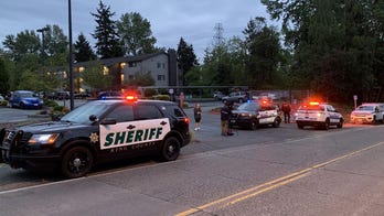 Fugitive murder suspect wielding knife fatally shot during attempted arrest in Seattle area, police say