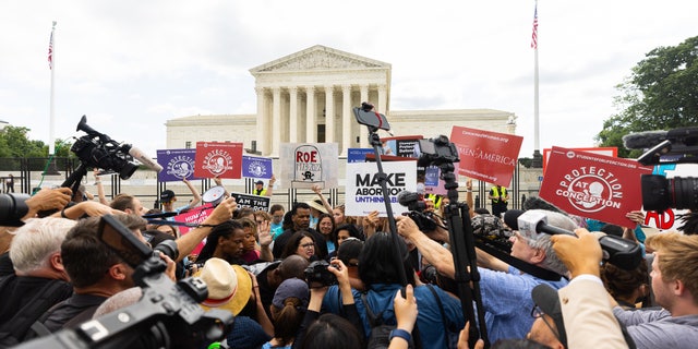 Crowds outside the Supreme Court reacting to the overturning of Roe. v. Wade. 