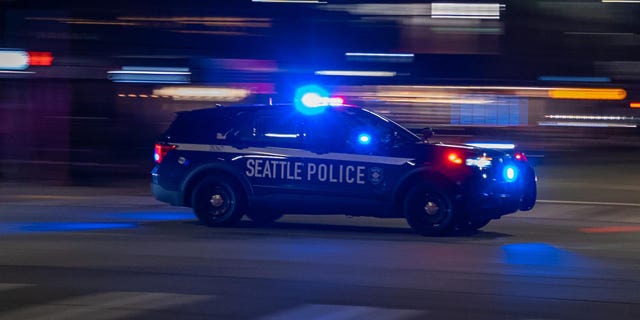 Seattle, Washington, USA - March 5, 2021: Seattle Police respond to a call in downtown Seattle.