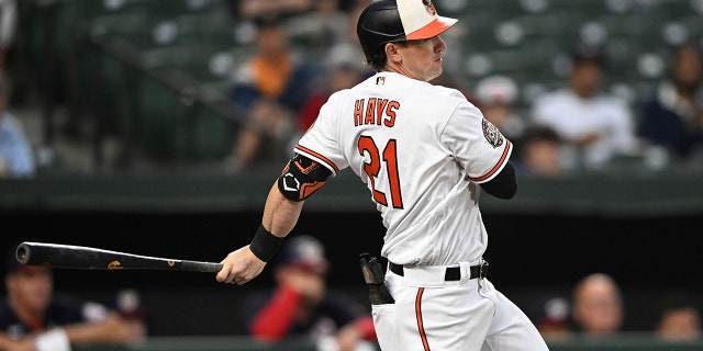 Austin Hayes of the Baltimore Orioles chases down a single against the Washington Nationals during the first inning of a baseball game on Wednesday, June 22, 2022 in Baltimore.