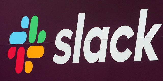 The Slack Technologies Inc. logo is seen on a banner outside the New York Stock Exchange (NYSE) during thew company's IPO in New York, U.S. June 20, 2019. REUTERS/Brendan McDermid