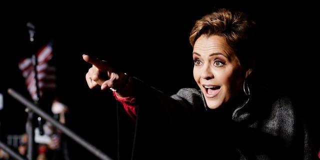 Republican primary candidate for Arizona governor Kari Lake speaks at a rally held by former U.S. President Donald Trump in Florence, Arizona, U.S., January 15, 2022. REUTERS/Carlos Barria