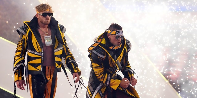 Logan Paul (left) and The Miz enter the arena to face The Mysterios (not pictured) during WrestleMania at AT and T Stadium.