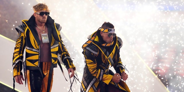 Logan Paul (left) and The Miz enter the arena to face The Mysterios (not pictured) during WrestleMania at AT&T Stadium. 