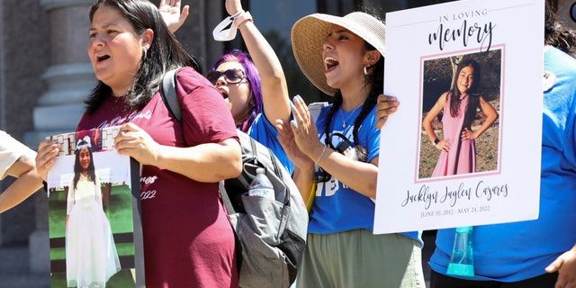 Gloria Cazares, mother of Jackie Cazares who was killed in Robb Elementary School shooting in Uvalde, Texas, reacts to a speech during a "March for Our Lives" rally, one of a series of nationwide protests against gun violence, in Austin, Texas, U.S. June 11, 2022.