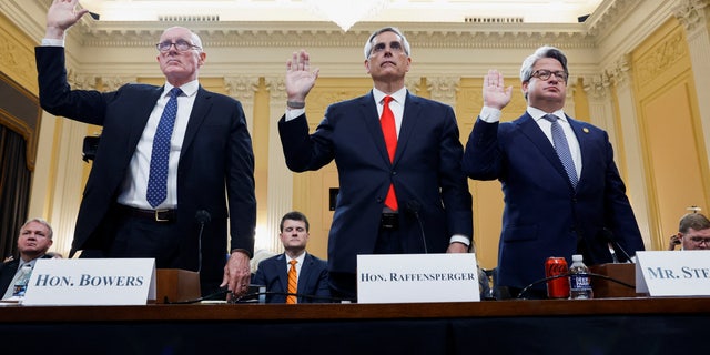 Arizona House Speaker Rusty Bowers, Georgia Secretary of State Brad Raffensperger and Georgia Secretary of State Chief Operating Officer Gabriel Sterling are sworn in to testify to the fourth of eight planned public hearings of the U.S. House Select Committee to investigate the January 6 Attack on the U.S. Capitol, on Capitol Hill in Washington, U.S. June 21, 2022. REUTERS/Jonathan Ernst