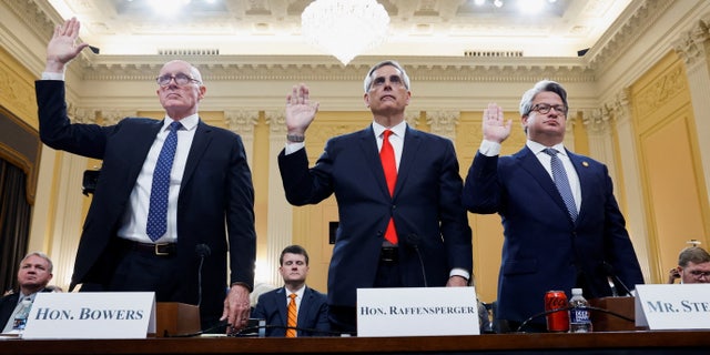 Arizona House Speaker Rusty Bowers, Georgia Secretary of State Brad Raffensperger and Georgia Secretary of State Chief Operating Officer Gabriel Sterling are sworn in to testify to the fourth of eight planned public hearings of the U.S. House Select Committee to investigate the January 6 Attack on the U.S. Capitol, on Capitol Hill in Washington, U.S. June 21, 2022. REUTERS/Jonathan Ernst