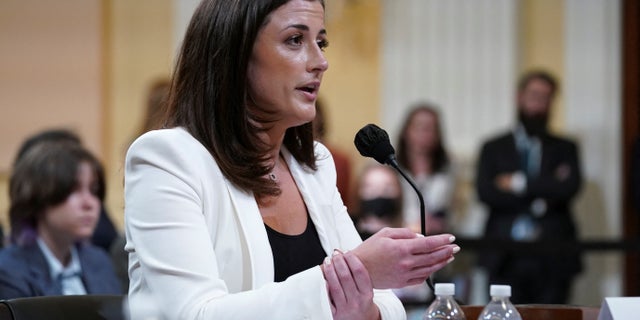 Cassidy Hutchinson, who was an aide to former White House Chief of Staff Mark Meadows during the administration of former U.S. President Donald Trump, demonstrates Trump's actions inside the presidential limousine on January 6 as she testifies during a public hearing of the U.S. House Select Committee to investigate the January 6 Attack on the U.S. Capitol, on Capitol Hill in Washington, U.S., June 28, 2022. REUTERS/Kevin Lamarque