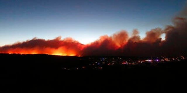 A wildfire burns on the outskirts of Flagstaff.