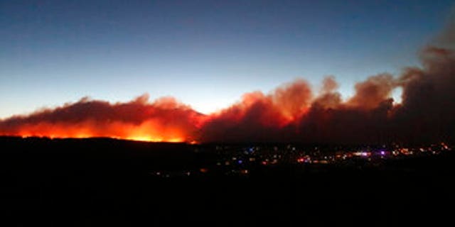 A wildfire burns on the outskirts of Flagstaff.