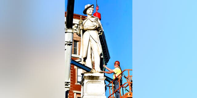 Georgia's Macon-Bibb County Commission is moving two Confederate monuments from Macon to a Confederate cemetery.