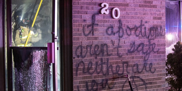Longmont Public Safety responded to a dispatch call of a fire at Life Choices shortly after 3 a.m. on June 25, 2022. Officers said the front of the building was vandalized with black spray paint. "If abortion aren't (sic) safe, neither are you," reads a spray-painted message near the front entrance. (Longmont Police Department)