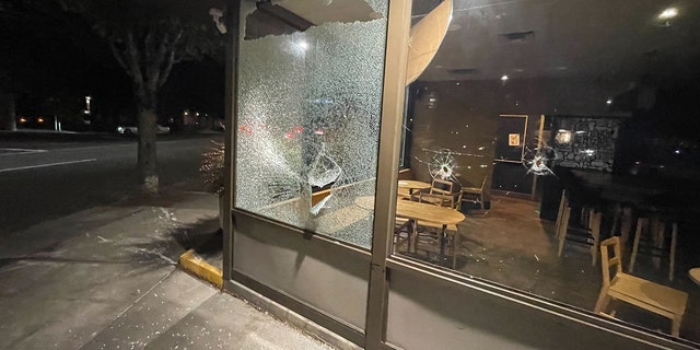 Rioters march through the streets of downtown Portland, smashing windows and graffitiing local businesses on June 25, 2022. (Fox News/Bradford Betz)
