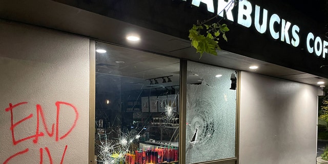 Rioters march the streets of downtown Portland, smashing windows and graffitiing local businesses on June 25, 2022. (Fox News/Bradford Betz)