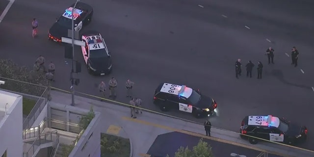 California Highway Patrol officers responding after an officer was shot and critically injured while conducting a traffic stop in Studio City near Hollywood.
