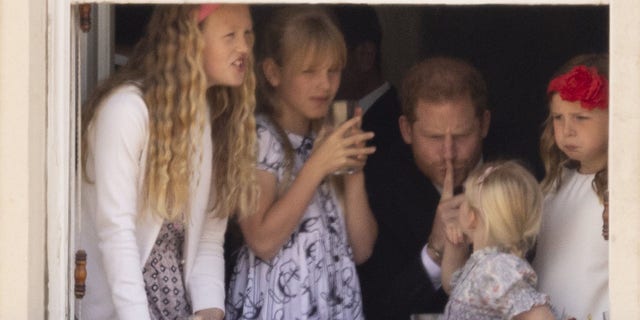 Prince Harry shushed some of his cousins during the Trooping the Colour ceremony. He did a similar gesture during the 1990 ceremony.