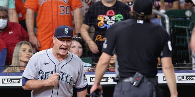 Scott Servais of the Seattle Mariners is sent off the field by umpire Chris Guccione during the ninth inning at Minute Maid Park on June 6, 2022, in Houston, Texas. (Carmen Mandato/Getty Images)