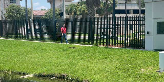 Attorney Pat Reilly leaves the FBI's Tampa office Friday.