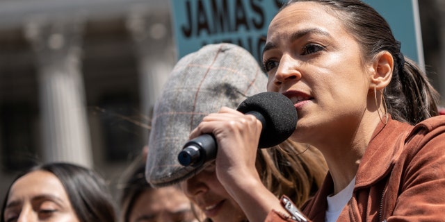 U.S. Rep. Alexandria Ocasio-Cortez (D-NY) speaks at a protest during International Workers Day in New York City on May 1, 2022. 