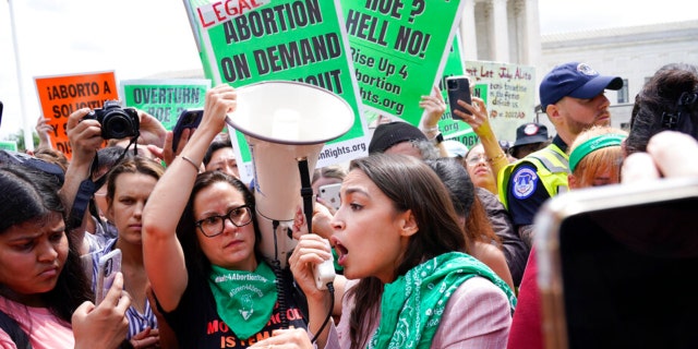 Rep. Alexandria Ocasio-Cortez, D-N.Y., speaks as she joins abortion-rights activists as they demonstrate following Supreme Court's decision to overturn Roe v. Wade in Washington, Friday, June 24, 2022.